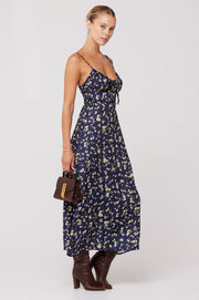 This is an image of Kaitlyn Midi in Midnight - RESA featuring a model wearing the dress