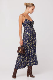 This is an image of Kaitlyn Midi in Midnight - RESA featuring a model wearing the dress