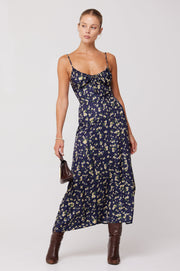 This is an image of Kaitlyn Midi in Midnight - RESA featuring a model wearing the dress