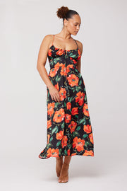 This is an image of Kaitlyn Midi in Poppy - RESA featuring a model wearing the dress