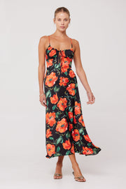 This is an image of Kaitlyn Midi in Poppy - RESA featuring a model wearing the dress