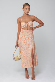 This is an image of Katie Crop in Sunstone - RESA featuring a model wearing the dress