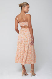 This is an image of Katie Crop in Sunstone - RESA featuring a model wearing the dress
