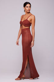 This is an image of Leina Top in Brick - RESA featuring a model wearing the dress