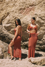 This is an image of Leina Top in Brick - RESA featuring a model wearing the dress
