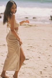 This is an image of Leina Top in Natural - RESA featuring a model wearing the dress