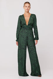 This is an image of Lenny Jumpsuit in Sparrow - RESA featuring a model wearing the dress