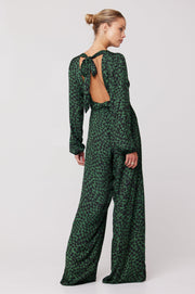 This is an image of Lenny Jumpsuit in Sparrow - RESA featuring a model wearing the dress