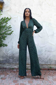 This is an image of Lenny Jumpsuit in Sparrow - RESA featuring a model wearing the dress