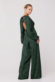 This is an image of Lenny Jumpsuit in Sparrow - RESA featuring a model wearing the dress