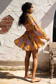 This is an image of Lyla Mini in Doheny - RESA featuring a model wearing the dress