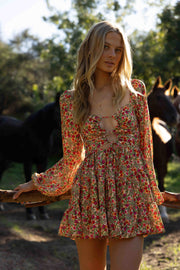 This is an image of Lyla Mini in Fleetwood - RESA featuring a model wearing the dress