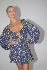 This is an image of Lyla Mini in Midnight - RESA featuring a model wearing the dress