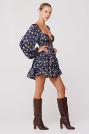This is an image of Lyla Mini in Midnight - RESA featuring a model wearing the dress
