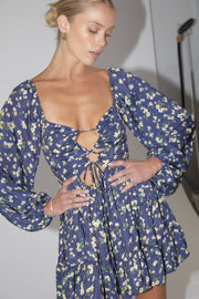 This is an image of Lyla Mini in Midnight - RESA featuring a model wearing the dress