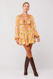 This is an image of Lyla Mini in Seychelles - RESA featuring a model wearing the dress