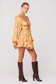 This is an image of Lyla Mini in Seychelles - RESA featuring a model wearing the dress