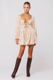 This is an image of Lyla Mini in Wildflower - RESA featuring a model wearing the dress