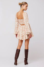 This is an image of Lyla Mini in Wildflower - RESA featuring a model wearing the dress