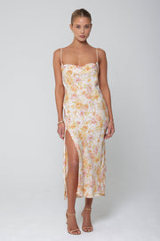 This is an image of Madison Slip in Gardenia - RESA featuring a model wearing the dress