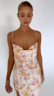 This is an image of Madison Slip in Gardenia - RESA featuring a model wearing the dress