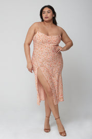 This is an image of Madison Slip in Sunstone - RESA featuring a model wearing the dress