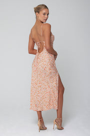 This is an image of Madison Slip in Sunstone - RESA featuring a model wearing the dress