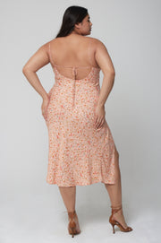 This is an image of Madison Slip in Sunstone - RESA featuring a model wearing the dress