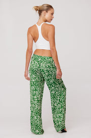 This is an image of Malcolm Trousers in Crayola - RESA featuring a model wearing the dress