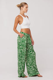 This is an image of Malcolm Trousers in Crayola - RESA featuring a model wearing the dress