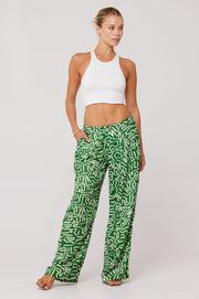 This is an image of Malcolm Trousers in Crayola - RESA featuring a model wearing the dress