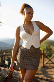This is an image of Mazzy Mini Skirt in Contempo - RESA featuring a model wearing the dress