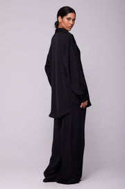 This is an image of Miley Set in Black - RESA featuring a model wearing the dress