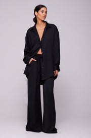 This is an image of Miley Set in Black - RESA featuring a model wearing the dress
