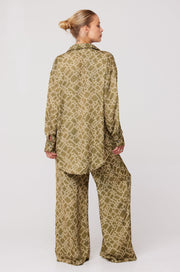 This is an image of Miley Set in Link - RESA featuring a model wearing the dress
