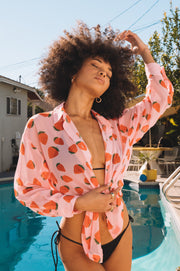 This is an image of Monica Blouse in Montecito - RESA featuring a model wearing the dress