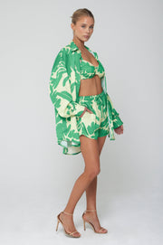 This is an image of Monica Blouse in Rico - RESA featuring a model wearing the dress