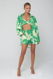 This is an image of Monica Blouse in Rico - RESA featuring a model wearing the dress