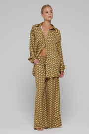 This is an image of Monica Blouse in Zuma - RESA featuring a model wearing the dress