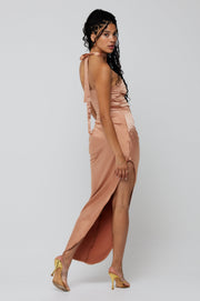 This is an image of Nicole Midi in Copper - RESA featuring a model wearing the dress