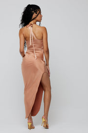 This is an image of Nicole Midi in Copper - RESA featuring a model wearing the dress