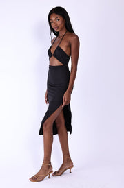 This is an image of Nikki Dress - RESA featuring a model wearing the dress