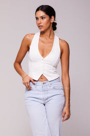 This is an image of Noah Vest in White - RESA featuring a model wearing the dress