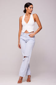 This is an image of Noah Vest in White - RESA featuring a model wearing the dress