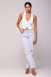 This is an image of Noah Vest in White - RESA featuring a model wearing the dress