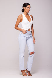 This is an image of Noah Vest in White - RESA featuring a model wearing the dress