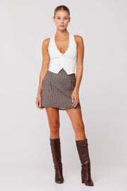 This is an image of Noah Vest in White - RESA featuring a model wearing the dress