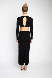 This is an image of Noelle Maxi - RESA featuring a model wearing the dress