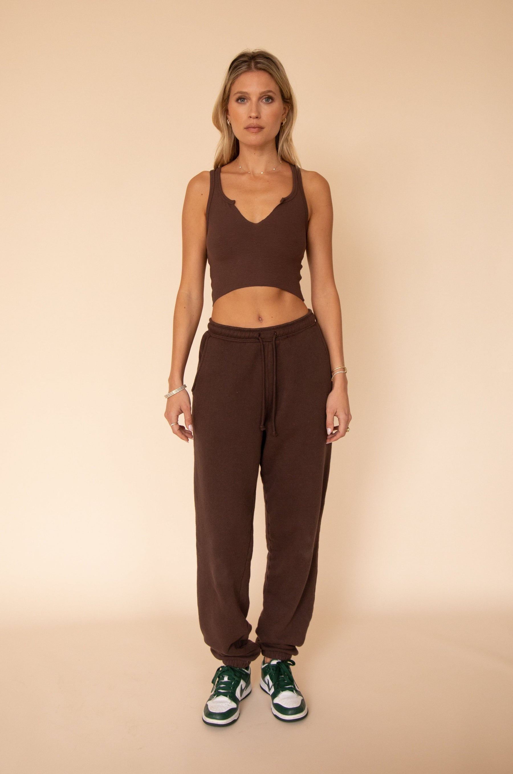 This is an image of Ozzy Tank in Brown - RESA featuring a model wearing the dress