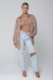 This is an image of Pepper Bra Top in Dallas - RESA featuring a model wearing the dress